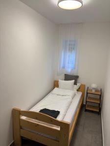 Postel nebo postele na pokoji v ubytování PP Apartman