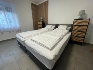 Postel nebo postele na pokoji v ubytování PP Apartman
