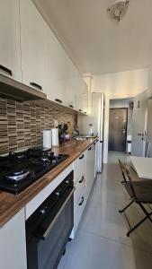 Η κουζίνα ή μικρή κουζίνα στο Single room Perfect for single or couples!
