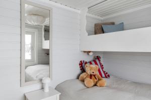 Postel nebo postele na pokoji v ubytování Brensholmen Beach House