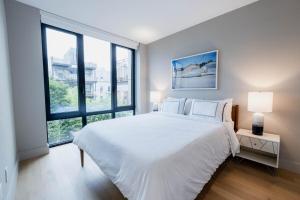 Ένα ή περισσότερα κρεβάτια σε δωμάτιο στο 149BK-301 New Construction 1BR Prime BK WD