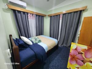 Postel nebo postele na pokoji v ubytování Talii Sasa Accommodation