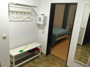Llit o llits en una habitació de Ferienwohnung Südpark Apartment - Bad Nauheim
