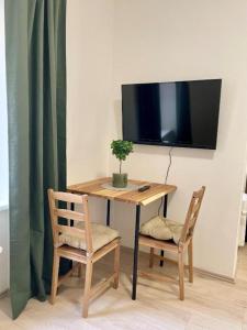 TV a/nebo společenská místnost v ubytování City Center Apartments - Moderna Brno Římské náměstí I