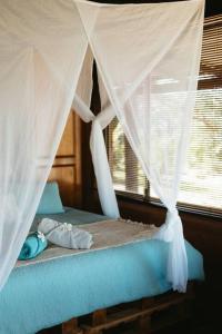 Ένα ή περισσότερα κρεβάτια σε δωμάτιο στο Sol Retreat Waterbank