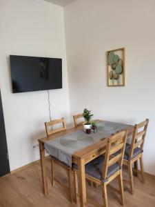 TV a/nebo společenská místnost v ubytování City Center Apartments - Moderna Brno Římské náměstí I