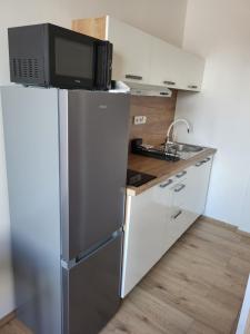 Kuchyň nebo kuchyňský kout v ubytování City Center Apartments - Moderna Brno Římské náměstí I