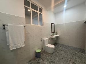 Koupelna v ubytování Aloe Transit Hotel