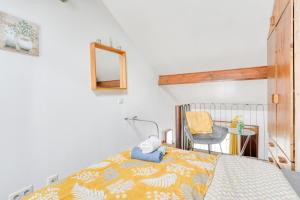 Postel nebo postele na pokoji v ubytování Sunny Suite-proche Paris & Disney