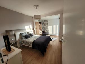 Posteľ alebo postele v izbe v ubytovaní Agréable Appartement avec Balcon
