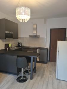 Kuchyň nebo kuchyňský kout v ubytování Residenza Lido adriano baia tartaruga
