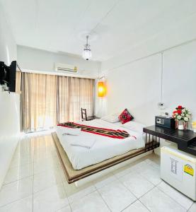 Postel nebo postele na pokoji v ubytování Sea Beach Paradise