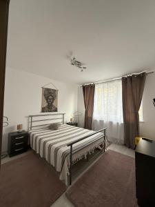 Giường trong phòng chung tại City Comfort Apartment +3 ảnh