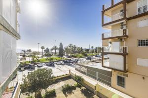an aerial view of a parking lot in front of a building at A&N San Gerardo 123 in Torre del Mar