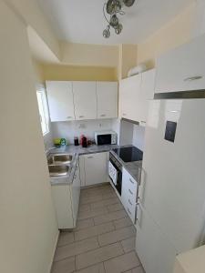 Kuchyň nebo kuchyňský kout v ubytování Uncle Tom's Penthouse