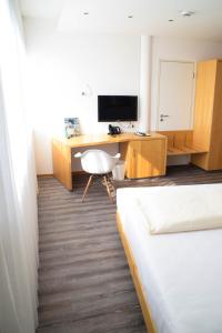 TV a/nebo společenská místnost v ubytování Cristall Hotel