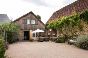 Taman di luar Le Grand Gite au Manoir de Carlucet