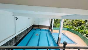 Bazén v ubytování TASHINI Hotel nebo v jeho okolí