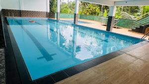Bazén v ubytování TASHINI Hotel nebo v jeho okolí