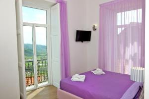 Postel nebo postele na pokoji v ubytování Antares Rooms