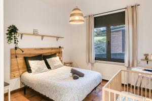 Postel nebo postele na pokoji v ubytování Can Maximino