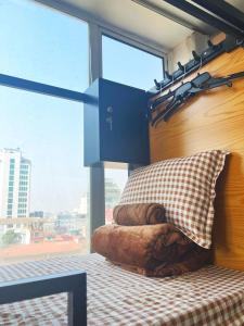 Postel nebo postele na pokoji v ubytování Hanoi Station Budget Backpackers - LushStay