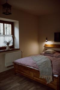 Postel nebo postele na pokoji v ubytování Apartmány Lešovice