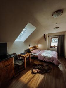 Postel nebo postele na pokoji v ubytování Apartmány Lešovice