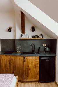 Kuchyň nebo kuchyňský kout v ubytování Apartmány Lešovice