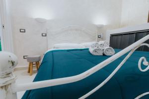 Postel nebo postele na pokoji v ubytování Fantasia A Mare