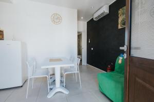 Kuchyň nebo kuchyňský kout v ubytování Fantasia A Mare