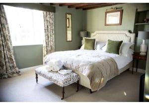 Postel nebo postele na pokoji v ubytování The Martins Arms