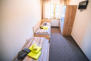 Postel nebo postele na pokoji v ubytování Wellness & Spa Hotel Čertov + 37 fotografií