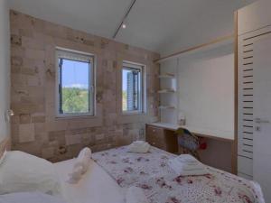 En eller flere senge i et værelse på Escape Villa Island Peaceful Oasis with Pool + 16 billeder