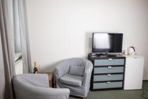 Televízia a/alebo spoločenská miestnosť v ubytovaní Penzión Furkotka