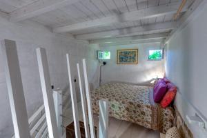 a small bedroom with a bed in a room at Villa Olivia pool tennis spa - D in Lecce +28 photos