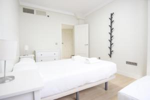 Postel nebo postele na pokoji v ubytování RentalSevilla Génova