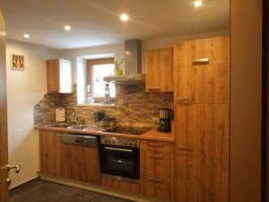 Una cocina o cocineta en Apart Alpinea