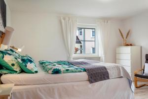 Postel nebo postele na pokoji v ubytování Ferienwohnung Weinberg