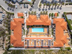 an overhead view of a building with an orange roof at Praia D'el Rey A1 - Golf & Beach in Óbidos