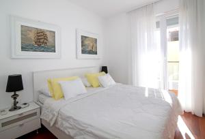 Posteľ alebo postele v izbe v ubytovaní 73 Stairs Apartment