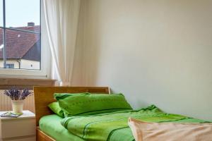 Postel nebo postele na pokoji v ubytování Ferienwohnung Weinberg