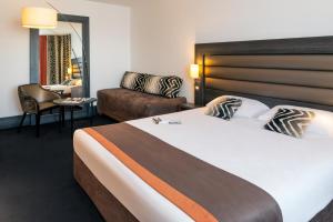 Postel nebo postele na pokoji v ubytování Mercure Lyon Centre - Gare Part Dieu