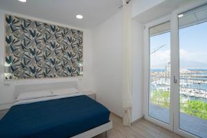 Postel nebo postele na pokoji v ubytování Mare oltre + 35 fotografií