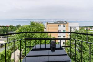 Balkón alebo terasa v ubytovaní Apartment Poznań Dąbrowskiego by Noclegi Renters
