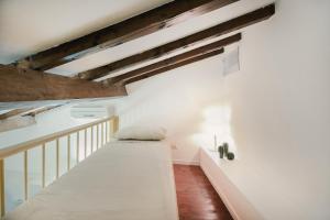 Uma cama ou camas num quarto em Anciüetta