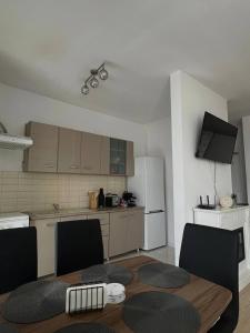 Η κουζίνα ή μικρή κουζίνα στο Rose Residence