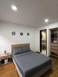 A bed or beds in a room at Hostelfc San Luis