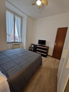 Posteľ alebo postele v izbe v ubytovaní Appartamento Sofia a Genova
