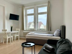 Posezení v ubytování Hansaring Apartments in Neumünster - Viel Platz für Gruppen und Monteure